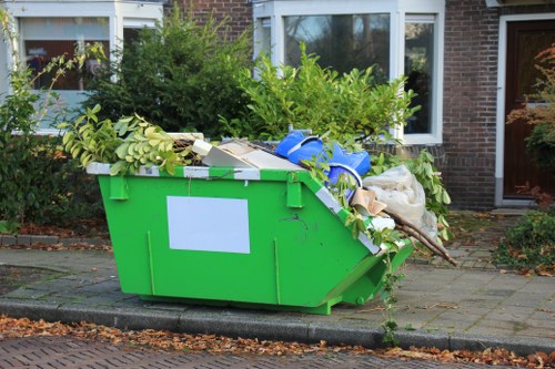 Team managing overgrown vegetation in a Soho outdoor space